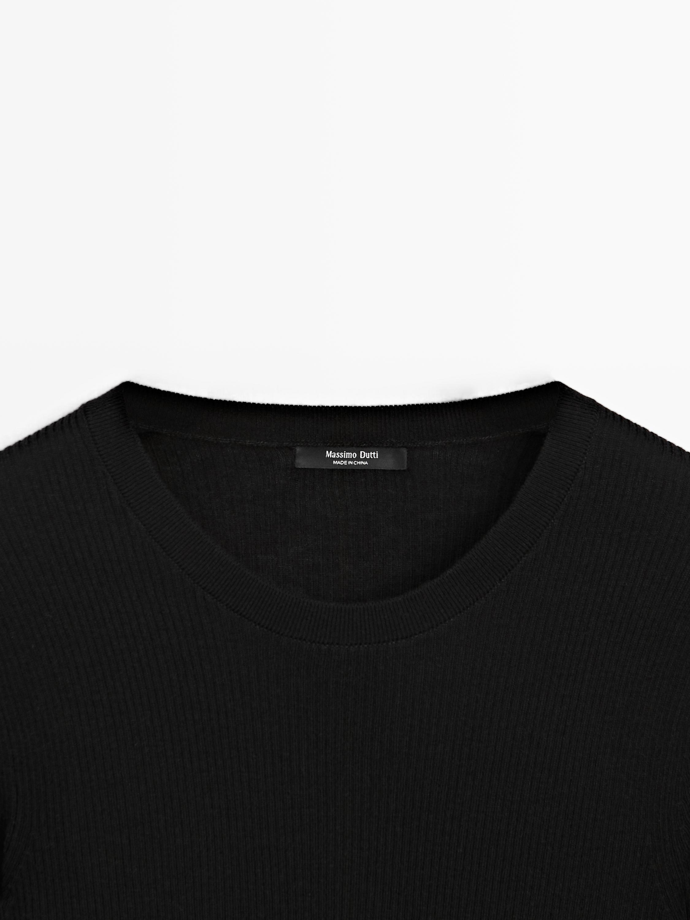 Ribbed knit round neck sweater